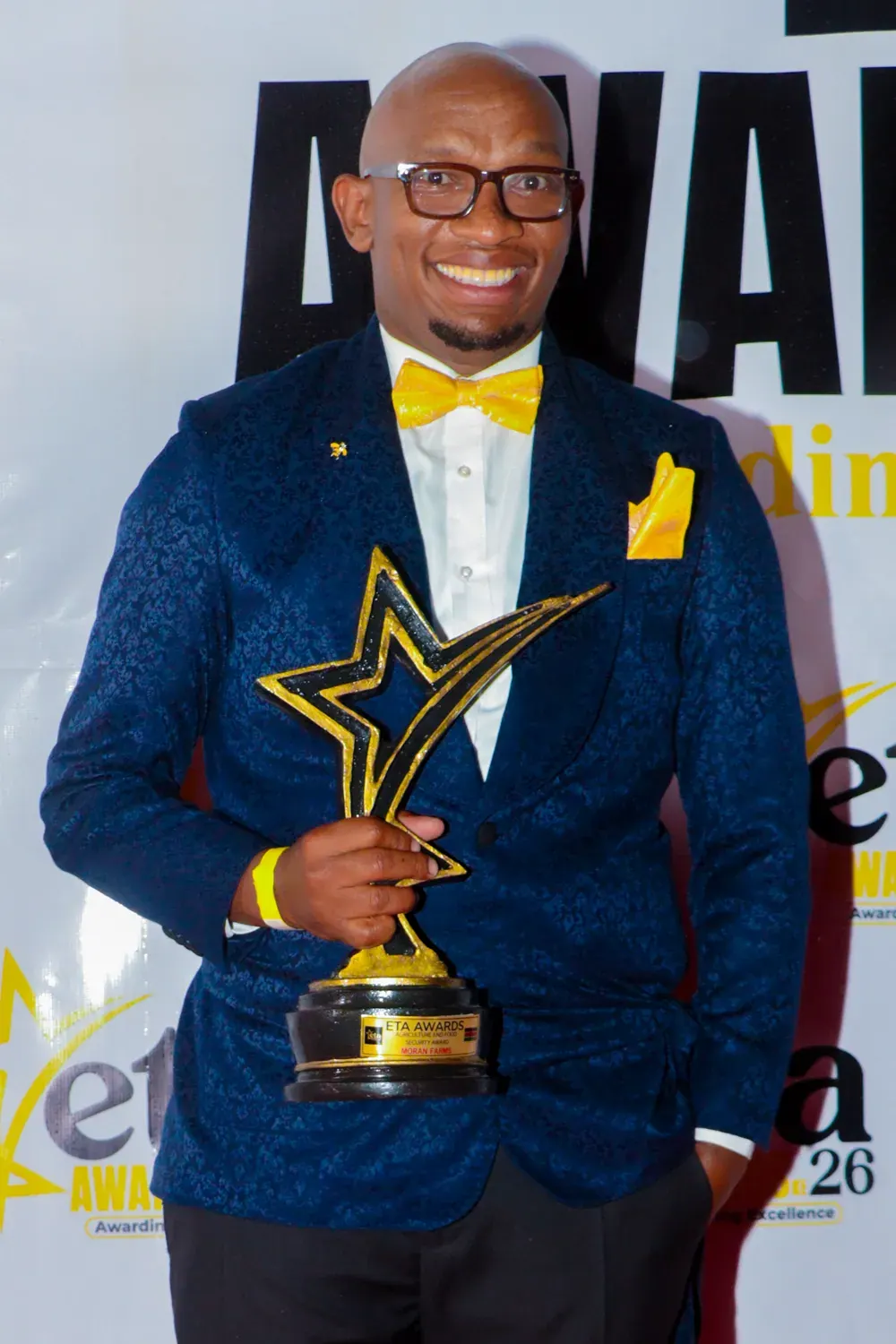 Siloma Stephen receiving the ETA Awards 2026 trophy
